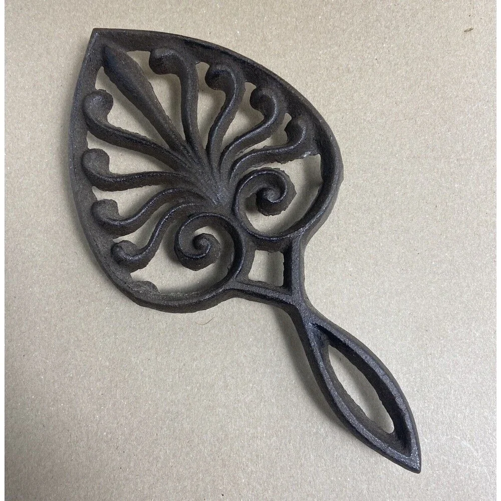 Brown Cast Iron Spade Footed Metal Trivet with handle 9.25 inches long